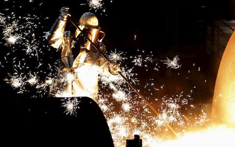 A Thyssenkrupp worker at the company's giant plant in Duisburg, Germany - Credit: Reuters