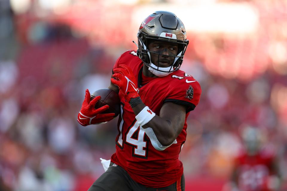 Tampa Bay Buccaneers wide receiver Chris Godwin (14) catches a pass for a touchdown against the New Orleans Saints in the fourth quarter at Raymond James Stadium Dec. 31, 2023.