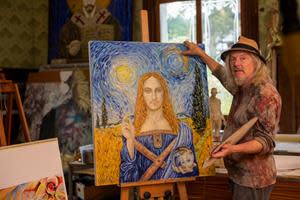 Wolfgang Beltracchi standing in front of a re-creation of the "Salvator Mundi" in the style of Vincent van Gogh (Image by: Alberto Venzago)