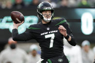 New York Jets quarterback Tim Boyle (7) passes against the Miami Dolphins during the second quarter of an NFL football game, Friday, Nov. 24, 2023, in East Rutherford, N.J. (AP Photo/Adam Hunger)