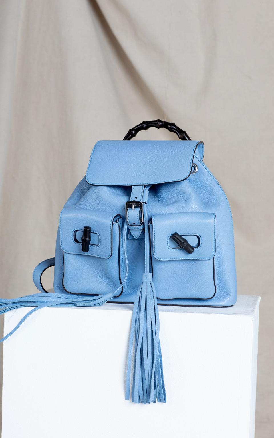 gucci backpack - Photography: Kevin Davies / Styling: Sophie Warburton / Photographic Direction: Krishna Sheth