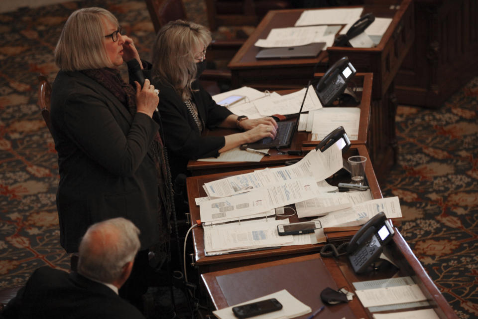 Kansas state Sen. Molly Baumgardner, R-Louisville, speaks in favor of a proposed anti-abortion amendment to the state constitution during a Senate debate, Thursday, Jan. 28, 2021, at the Statehouse in Topeka, Kan. The proposed amendment would not ban abortion, but it would allow the Legislature to enact a ban if the U.S. Supreme Court overturns its landmark 1973 Roe v. Wade decision protecting abortion rights. (AP Photo/John Hanna)