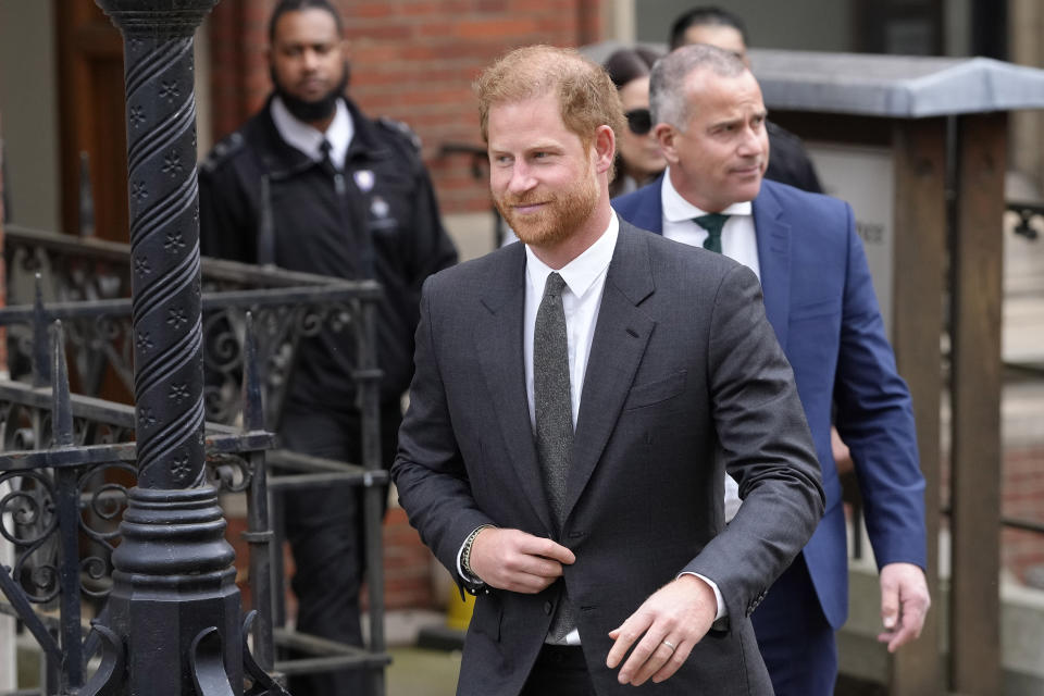 FILE - Britain's Prince Harry leaves the Royal Courts Of Justice in London, on March 30, 2023. Prince Harry alleged Thursday, March 21, 2024, that the publisher of The Sun tabloid unlawfully intercepted phone calls of his late mother, Princess Diana, and father, now King Charles III, as he sought to expand his privacy invasion lawsuit against News Group Newspapers. (AP Photo/Kirsty Wigglesworth, File)