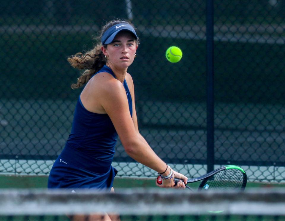 McKeel's Sarah Steeves hits a backhand during the No. 2 singles final at the West County tournament.