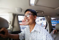 Reuters reporter Wa Lone reacts in a vehicle after being freed from Insein prison after receiving a presidential pardon in Yangon, Myanmar, May 7, 2019. REUTERS/Ann Wang