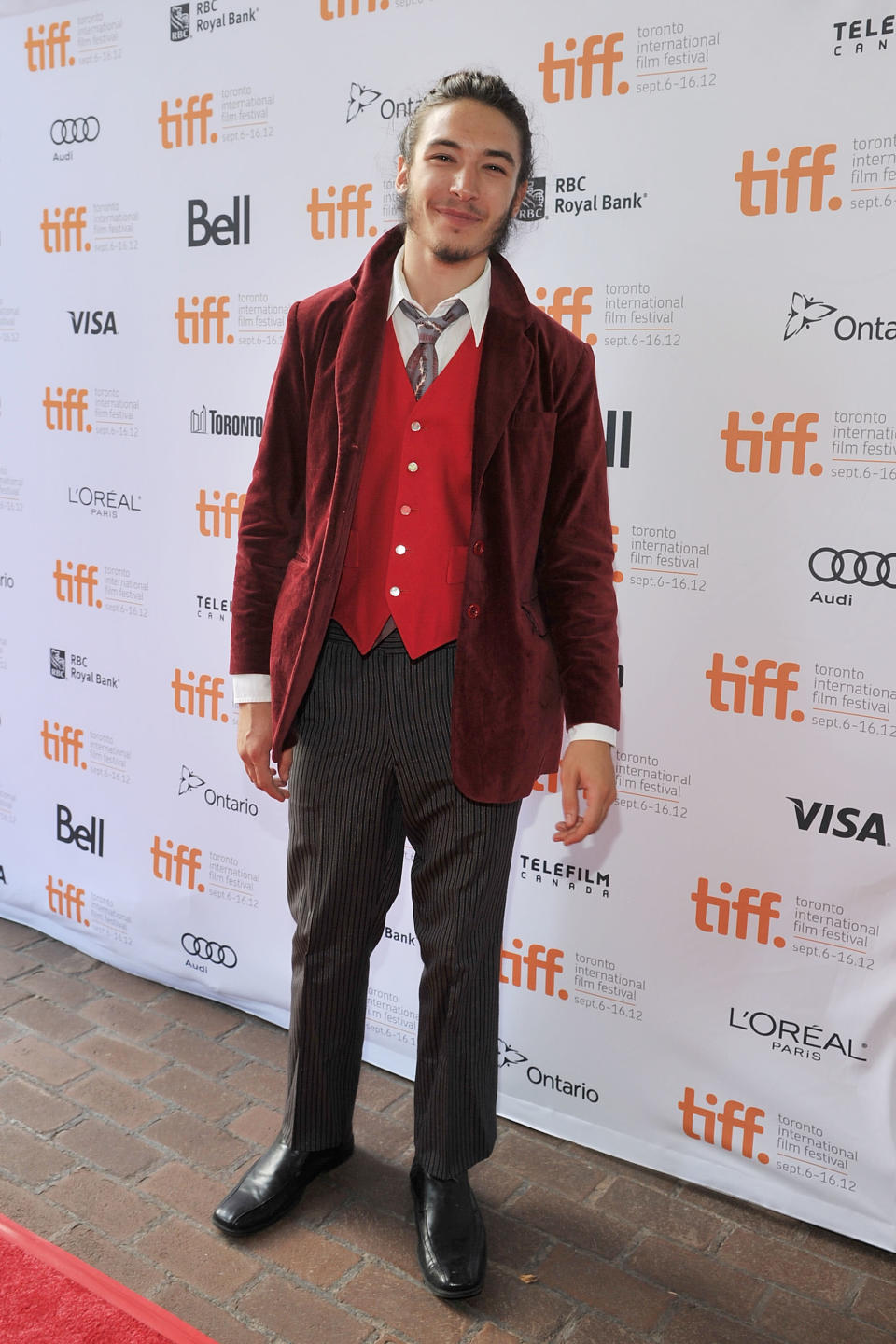 WORST: Ezra Miller is known for being a bit quirky, but his "Perks of Being a Wallflower" premiere outfit is still far too strange. We do admire his French braid, though.