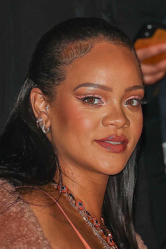 Rihanna looks in the distance in a close-up of her face