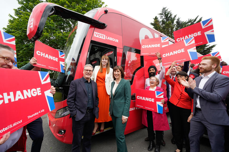 All aboard the campaign battle bus for Sir Keir Starmer, Angela Rayner and Rachel Reeves in Uxbridge, west London (Lucy North/PA)