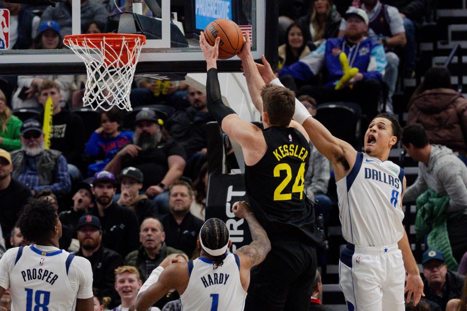 Utah Jazz center Walker Kessler (24) shoots the ball with Dallas Mavericks guard Josh Green (8) on defense during the NBA basketball game between the Utah Jazz and the Dallas Mavericks at the Delta Center in Salt Lake City on Monday, Jan. 1, 2024. | Megan Nielsen, Deseret News