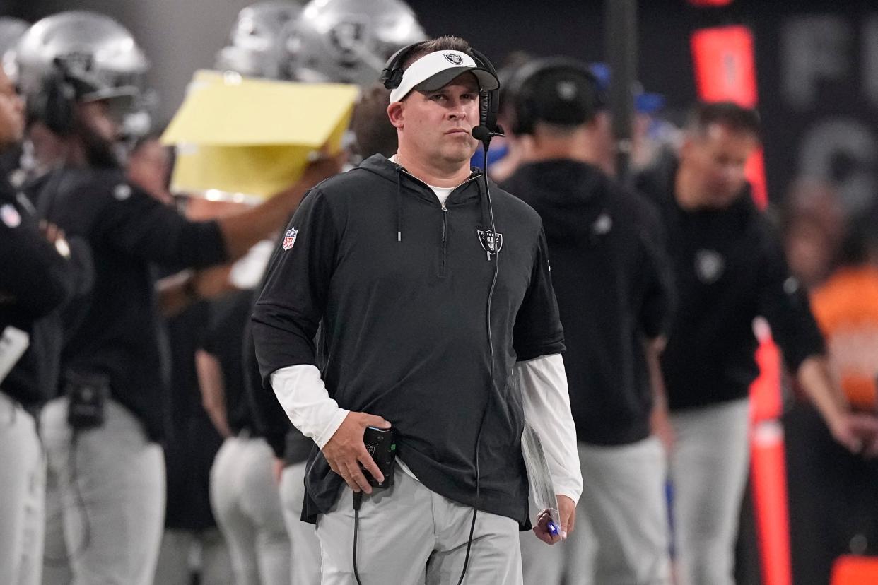 Las Vegas Raiders head coach Josh McDaniels walks on the sideline during the first half of an NFL football game against the Pittsburgh Steelers Sunday, Sept. 24, 2023, in Las Vegas.