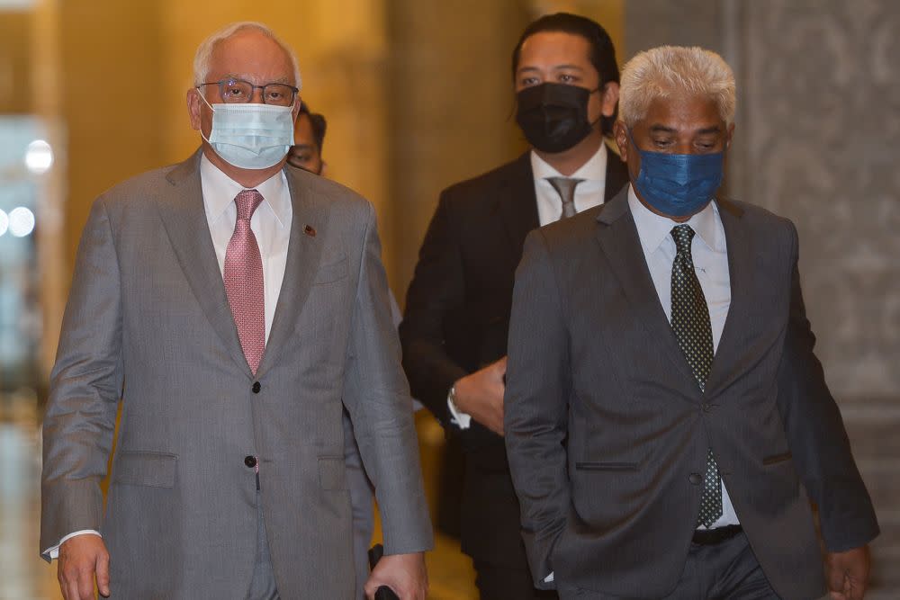 Datuk Seri Najib Razak arrives at the Court of Appeal in Putrajaya April 14, 2021. — Picture by Miera Zulyana