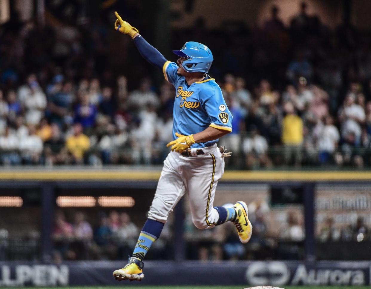 Willy Adames points toward the Brewers bullpen as he rounds the bases after hitting a three-run home run against the Yankees in September.