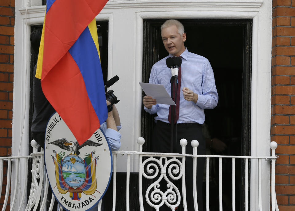 FILE - In this Sunday, Aug. 19, 2012 file photo, Julian Assange, founder of WikiLeaks makes a statement from a balcony of the Equador Embassy in London. Judge Vanessa Baraitser has ruled that Julian Assange cannot be extradited to the US. because of concerns about his mental health, it was reported on Monday, Jan. 4, 2021. Assange had been charged under the US's 1917 Espionage Act for "unlawfully obtaining and disclosing classified documents related to the national defence". (AP Photo/Kirsty Wigglesworth, File)