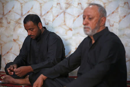 Bassem, brother of Saad Khudair Abbas, who was killed with a group of youth by Islamic State militants at Kirkuk road, is seen during the interview with Reuters in Kerbala, Iraq July 5, 2018. Picture taken July 5, 2018. REUTERS/Abdullah Dhiaa al-Deen