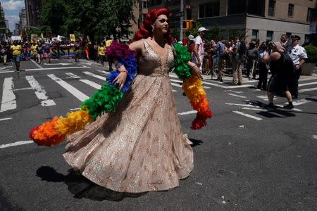 Participants take part in the LGBT Pride March in the Manhattan borough of New York City, U.S., June 25, 2017. REUTERS/Carlo Allegri