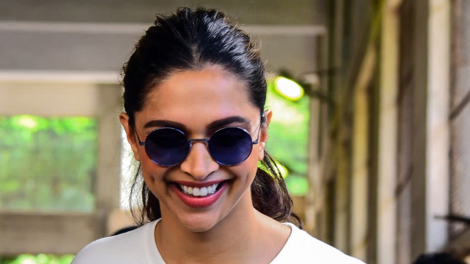 Bollywood actress Deepika Padukone shows her tattooed finger after voting at a polling station during the state assembly elections in Mumbai on October 21, 2019. - Sujit Jaiswal/AFP/Getty Images