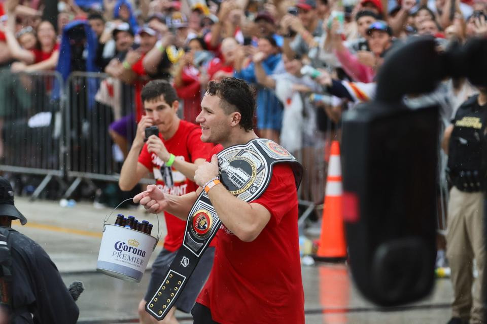 Jun 30, 2024; Fort Lauderdale, Florida, USA; Florida Panthers left wing Matthew Tkachuk celebrates with fans during the Stanley Cup victory parade and celebration. Mandatory Credit: Sam Navarro-USA TODAY Sports