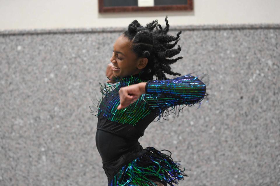 Dana Jones performs her routine during the third 'Celebrate Black History Month' celebration inside Jackson City Hall in Jacskon, Tenn., on Friday, Feb. 16, 2024.