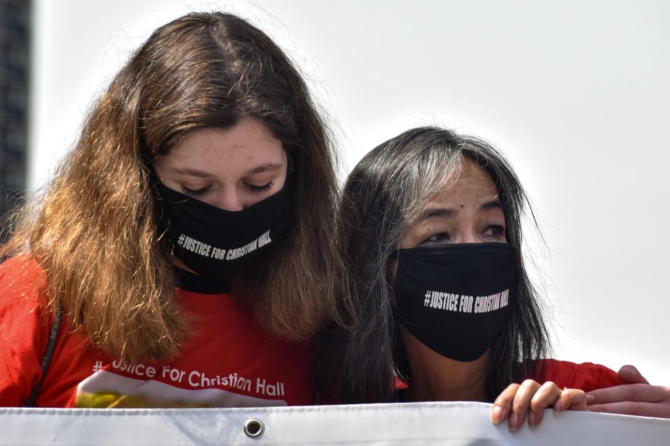 Jessica Brady, left, a Stroudsburg High School student who organized a march for Christian Hall in Monroe County, hugs Fe Hall, Christian's mother, in Philadelphia on Saturday, April 10, 2021.
