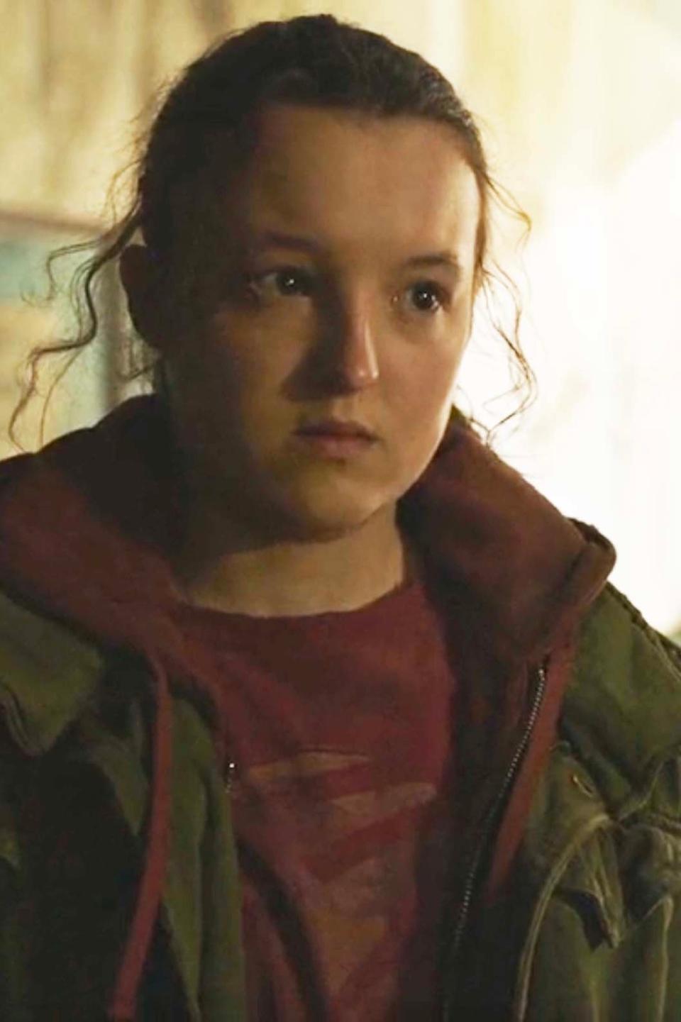 Ellie in The Last of Us Season 1 wearing her signature t-shirt and green jacket