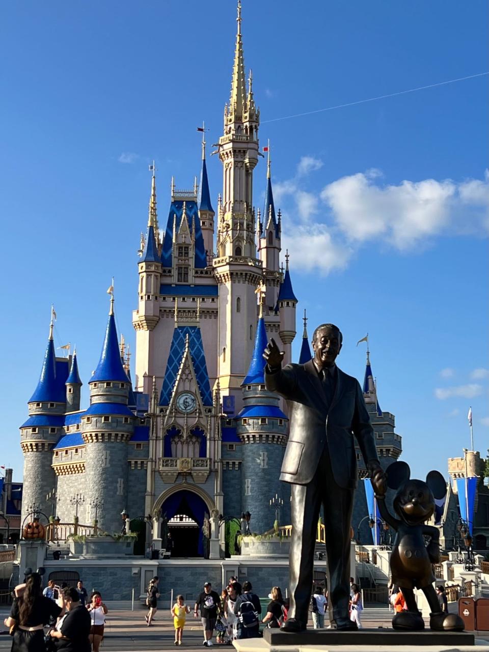 Walt Disney and Mickey Mouse are honored in the Partners Statue at Disney World's Magic Kingdom.