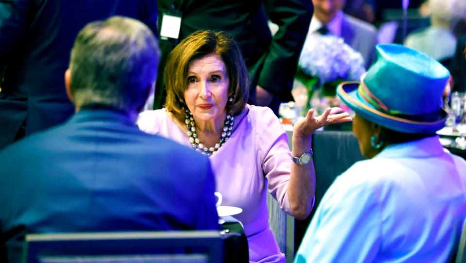 Former Democratic U.S. House Speaker Nancy Pelosi talks with Gov. Roy Cooper and U.S. Rep. Alma Adams during the North Carolina Democratic Party Unity Dinner at the Raleigh Convention Center Saturday, July 20, 2024
