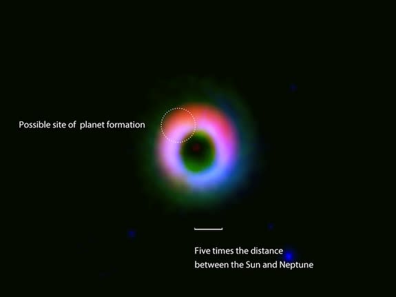 The dust and gas around the star HD142527 observed by ALMA are shown in red and green, respectively, while near-infrared observations taken by the NAOJ Subaru Telescope are shown in blue. The dust is heavily concentrated in the northern (upper)