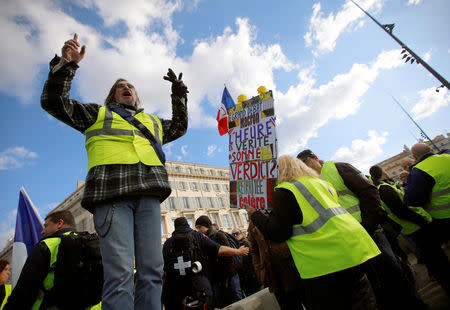 Protesters wearing yellow vests take part in a demonstration of the "yellow vests" movement in Marseille, France, January 19, 2019. REUTERS/Jean-Paul Pelissier