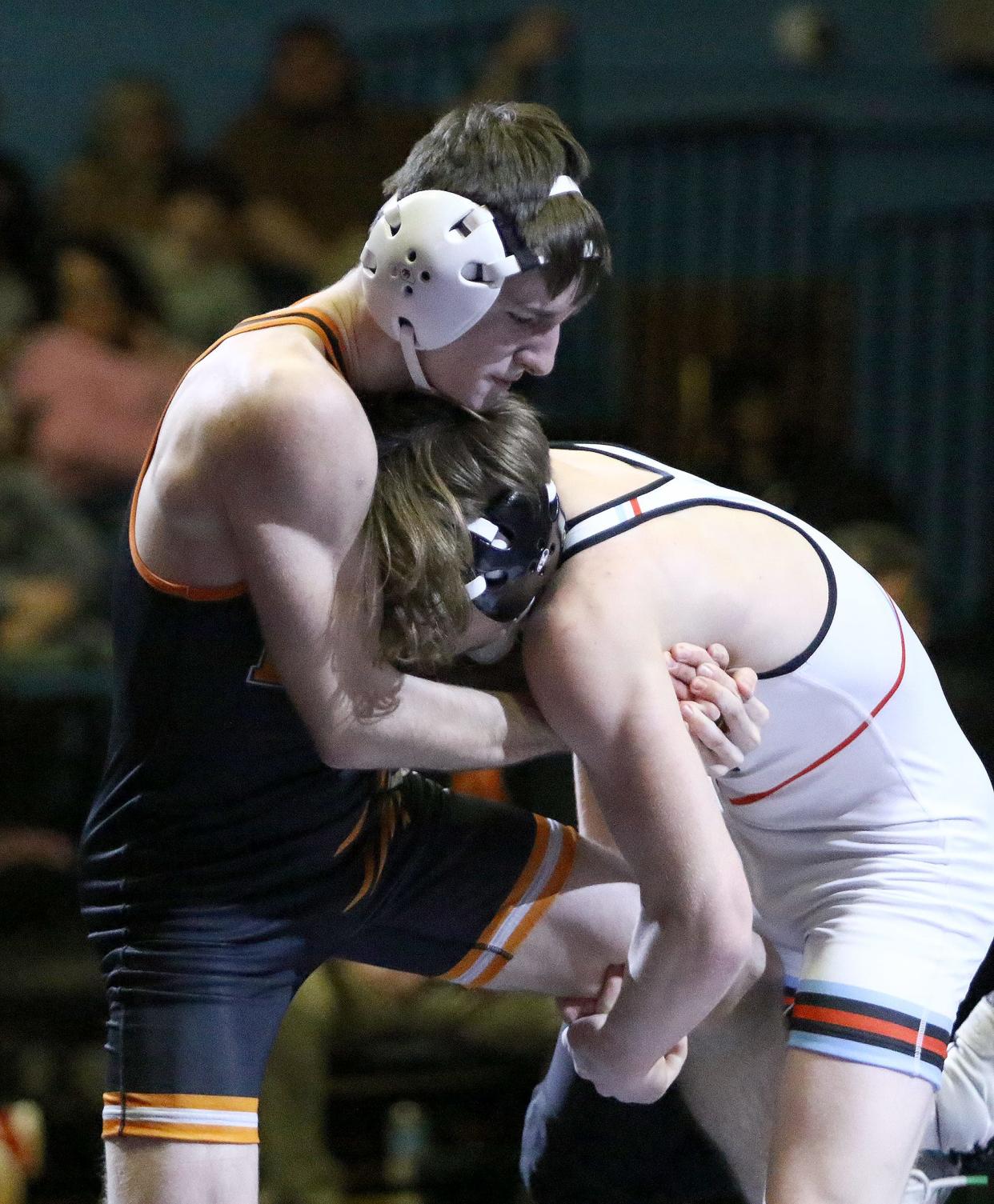 Marlington's Carter Hill, left, and Alliance's Johnny Beltz battle in a 138-pound match Feb. 9, 2023, at Alliance.