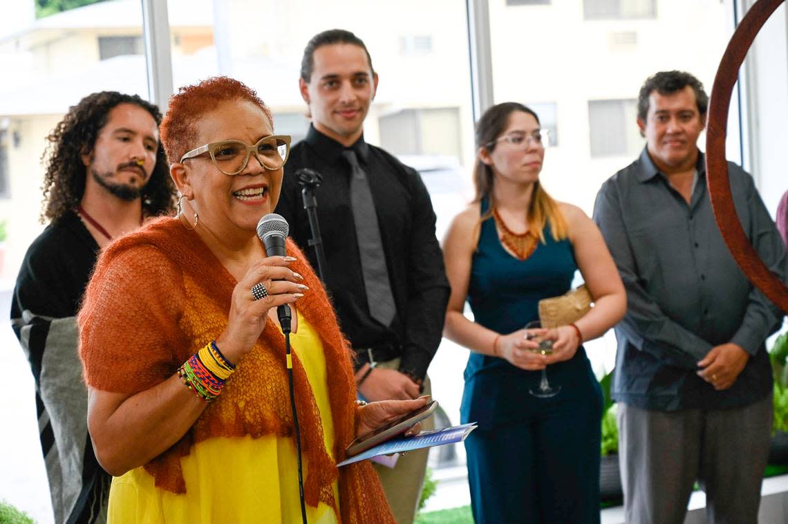 Rosie Gordon-Wallace, the founder of Diaspora Vibe Culture Arts Incubator, gives a speech at the opening reception for “Depth of Identity: Art as Memory and Archive” Thursday evening at Green Space Miami. Gordon-Wallace curated the art exhibition.