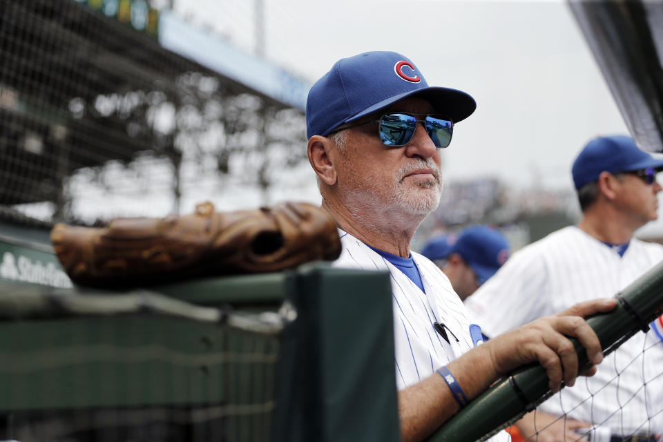 CHICAGO, ILLINOIS - SEPTEMBER 21: Manager Joe Maddon #70 of the Chicago Cubs stands in the dugout  during the game  against the St. Louis Cardinals at Wrigley Field on September 21, 2019 in Chicago, Illinois. (Photo by Nuccio DiNuzzo/Getty Images)