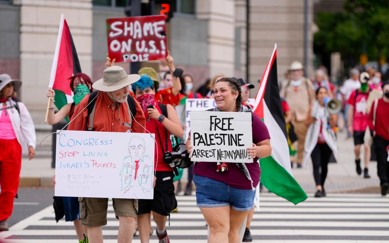 Demonstrators gather near the Capitol ahead of Israeli Prime Minister Benjamin Netanyahu's visit to Washington