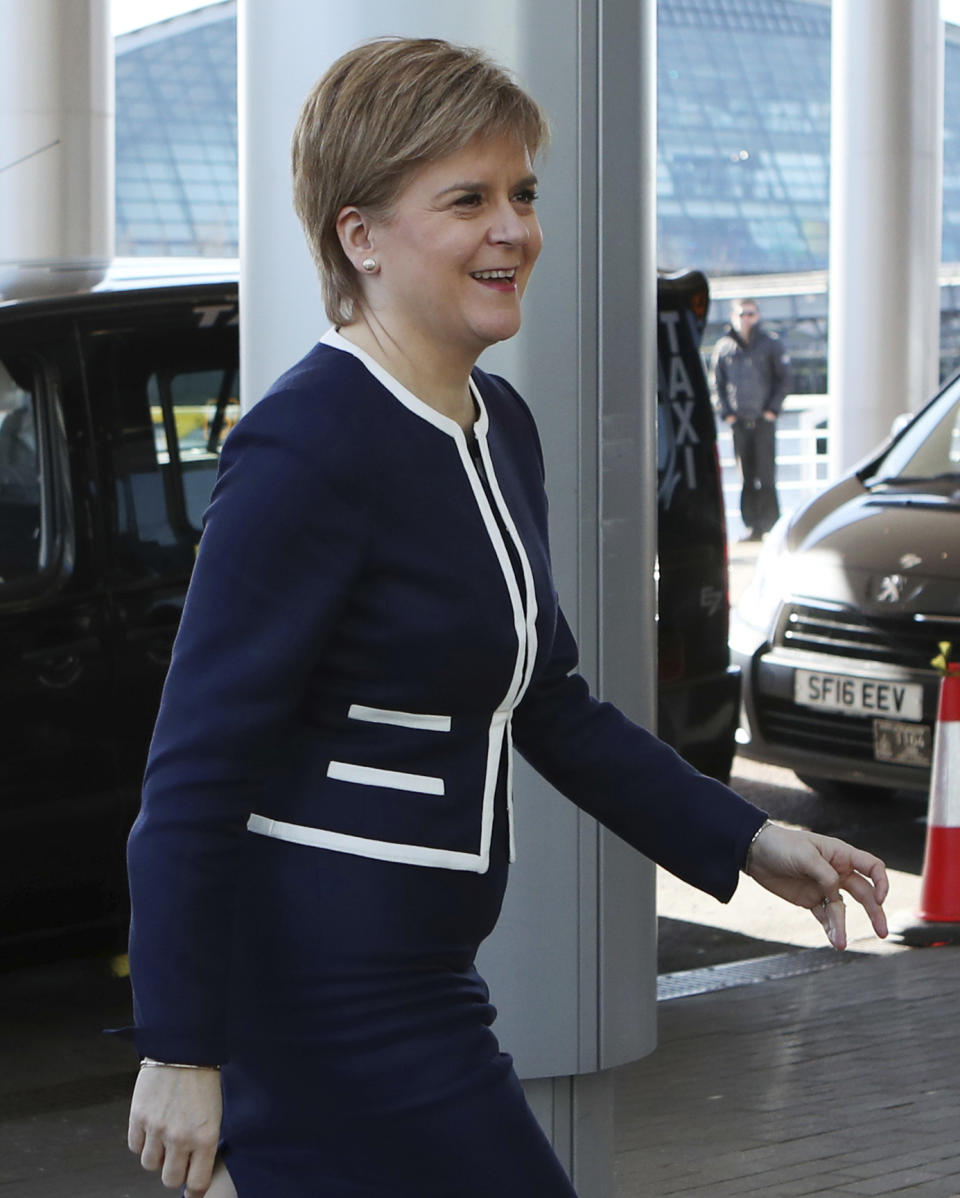 First Minister of Scotland Nicola Sturgeon arrives at a hotel in Glasgow, Scotland to take part in a bilateral meeting with Britain's Prime Minister Theresa May who is on a visit to Scotland Monday March 27, 2017. May and Sturgeon will meet for the first time since they faced off in a struggle over a new push for Scottish independence as the U.K. leaves the European Union. (Jane Barlow/PA via AP)