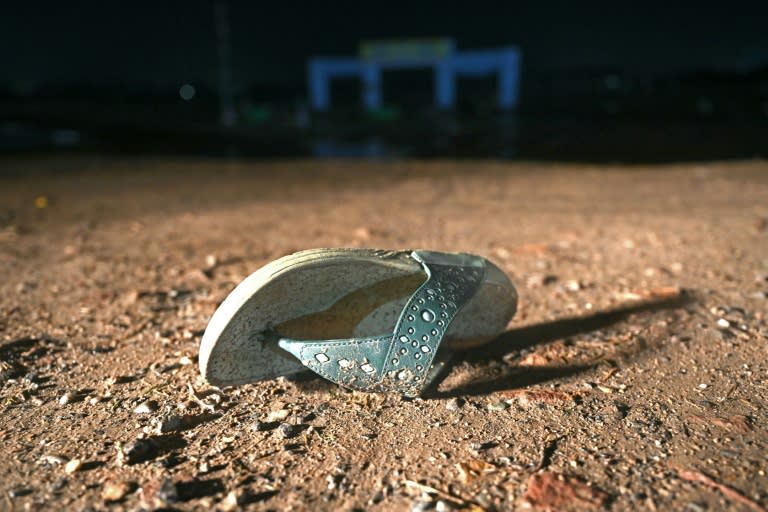 An empty sandal bears witness to a stampede that killed at least 116 people during a Hindu religious gathering in northern India on Tuesday night (Arun SANKAR)