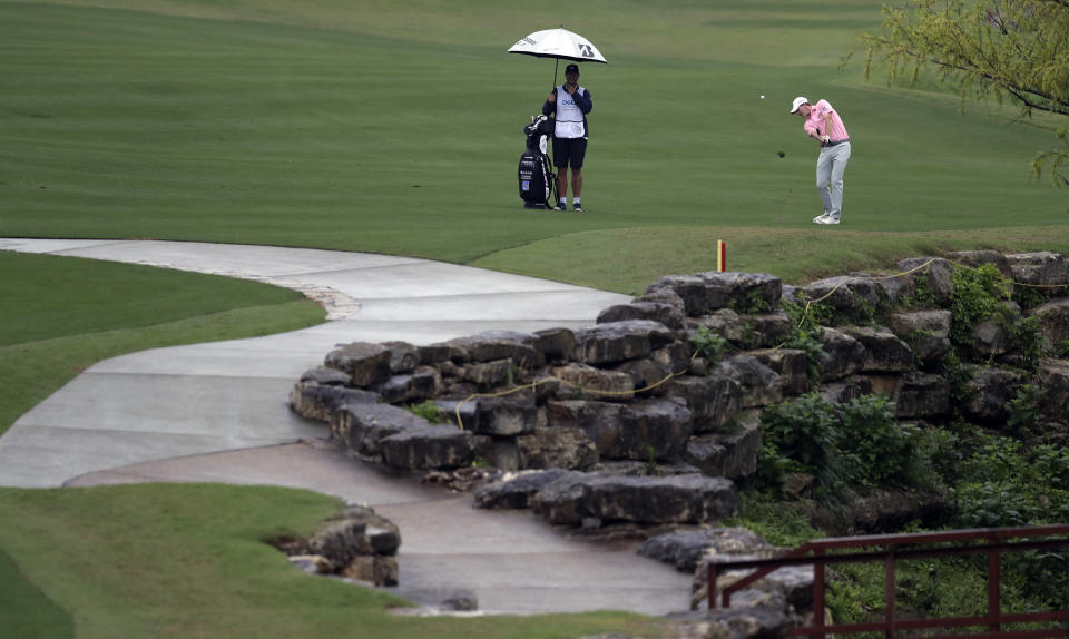 Brandt Snedeker, right, hits on the third hole during round-robin play at the Dell Technologies Match Play golf tournament at Austin County Club, Friday, March 24, 2017, in Austin, Texas. (AP Photo/Eric Gay)