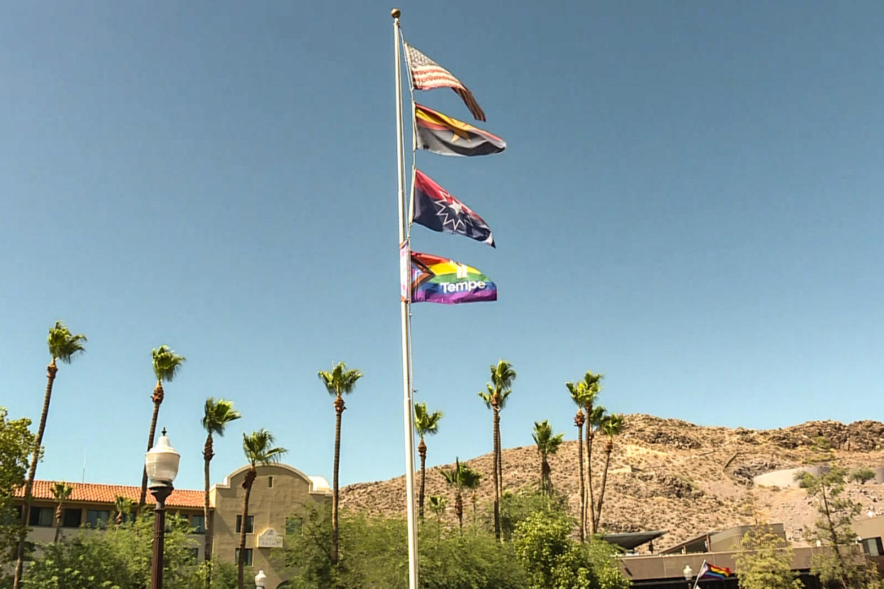 An LGBTQ Pride flag was raised outside the City Hall building in Tempe, Ariz., to celebrate Pride Month.  (KPNX)