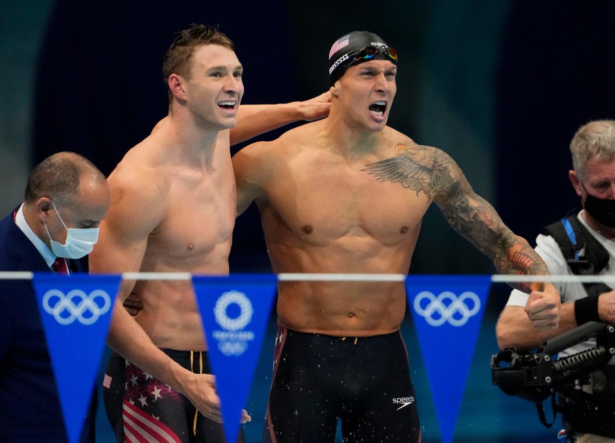 United States teammates Ryan Murphy and Caeleb Dressel celebrate after winning the men's 4x100-meter medley final during the Tokyo Olympics.