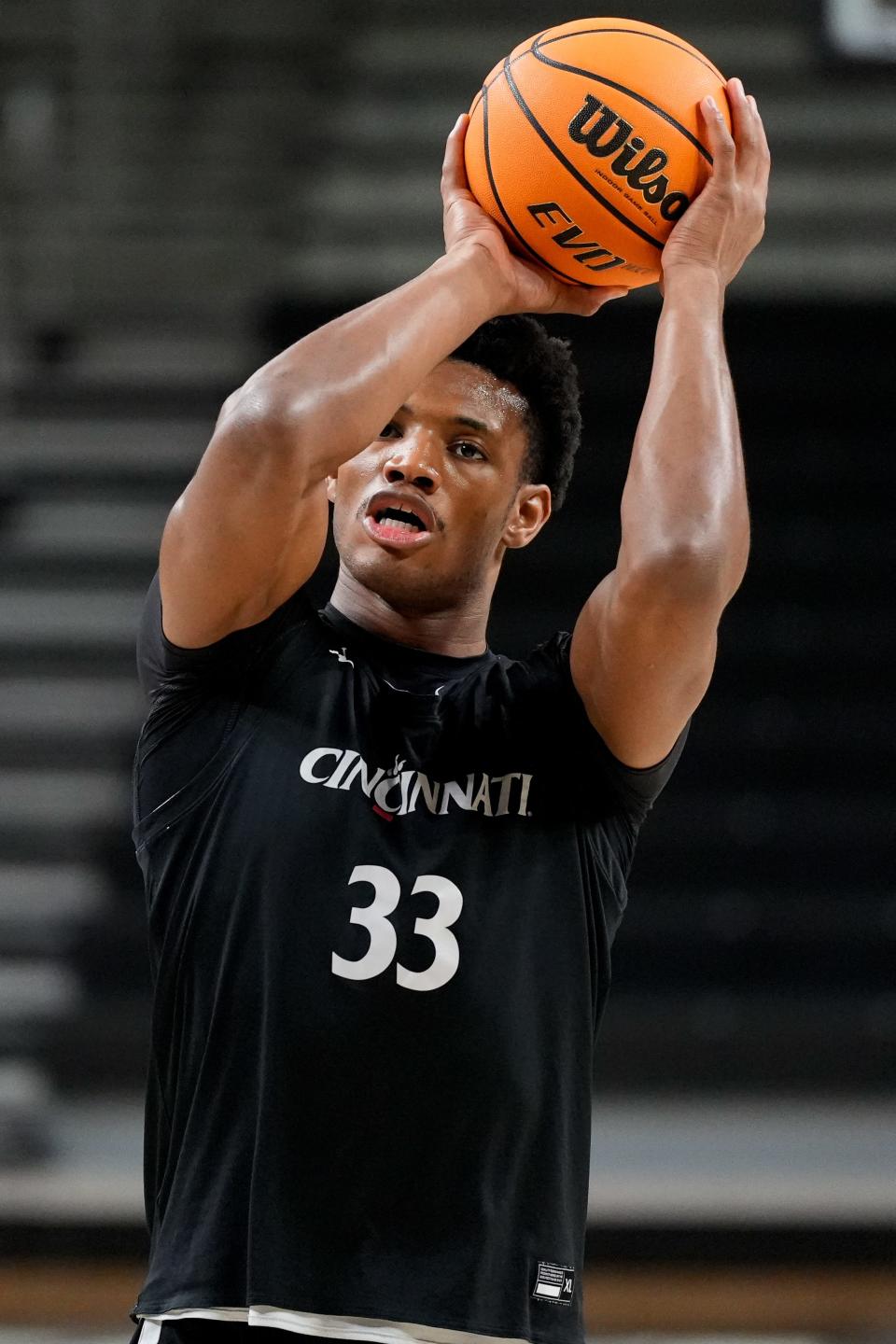 Cincinnati Bearcats forward Ody Oguama (33) takes free throw shots during a preseason practice at Fifth Third Arena in Cincinnati on Tuesday, Oct. 3, 2023.