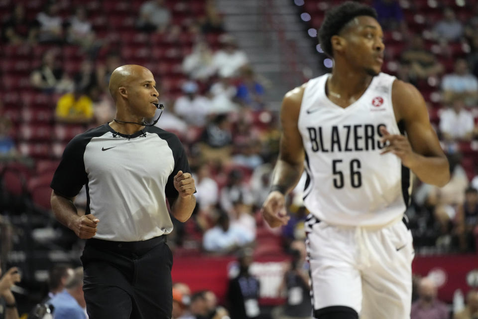 Former NBA player Richard Jefferson, left, officiates part of an NBA summer league basketball game between the Portland Trail Blazers and the New York Knicks, Monday, July 11, 2022, in Las Vegas. (AP Photo/John Locher)