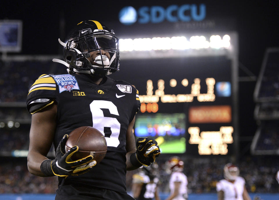 Iowa wide receiver Ihmir Smith-Marsette reacts after scoring a touchdown during the first half of the Holiday Bowl NCAA college football game against Southern California, Friday, Dec. 27, 2019, in San Diego. (AP Photo/Orlando Ramirez)