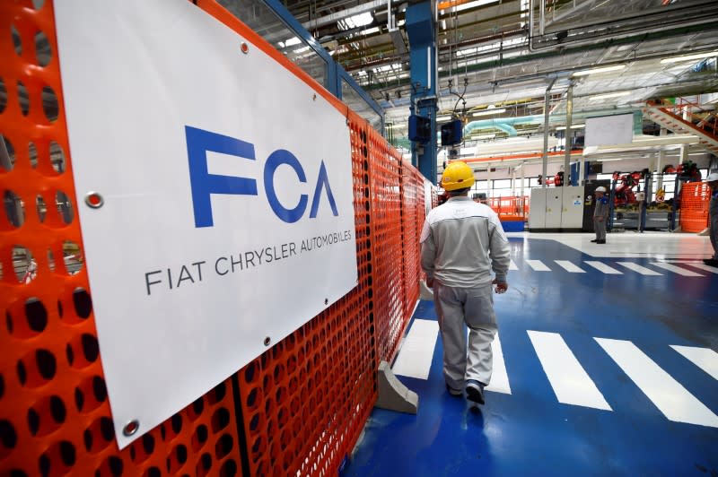 FILE PHOTO: Ceremony to mark the installation of the first robot on the production line for the new electric Fiat 500 BEV at the Mirafiori industrial complex on the 80th birthday of the plant