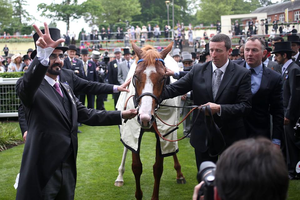 Sheikh Mohammed bin Rashid Al Maktoum in the winners enclosure with his horse Dawn Approach after it won the St James's Palace Stakes on day one of the Royal Ascot meeting at Ascot Racecourse, Berkshire. 