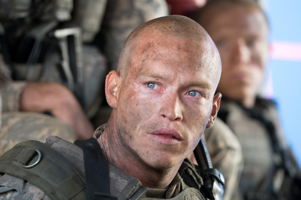 This image released by Screen Media shows Caleb Landry Jones in a scene from "The Outpost." The film tells the story of the heroic Battle of Kamdesh in Afghanistan in 2009, where the Taliban attacked a remote American Combat Outpost that was nearly impossible to defend. (Screen Media via AP)