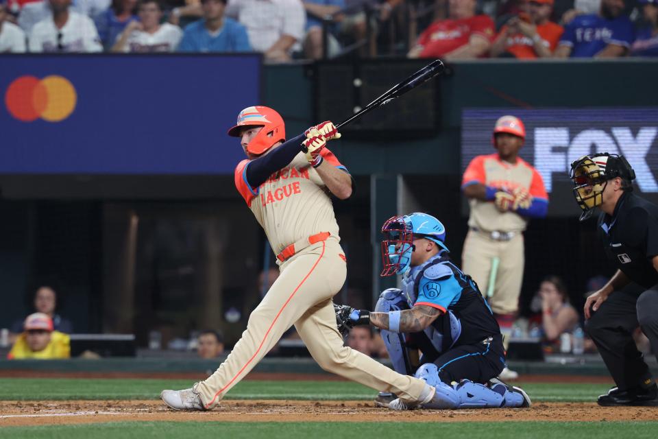 David Fry of the Cleveland Guardians hits an RBI single in the third inning of the MLB All-Star game, July 16, 2024, in Arlington, Texas.