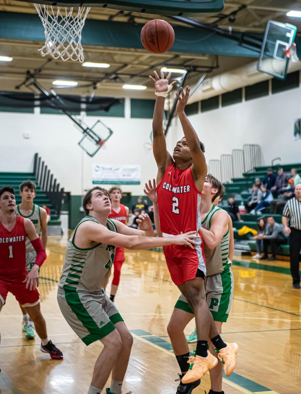 Coldwater's Lu Lebron goes to the basket during first half action at Pennfield High School on January 18, 2022.