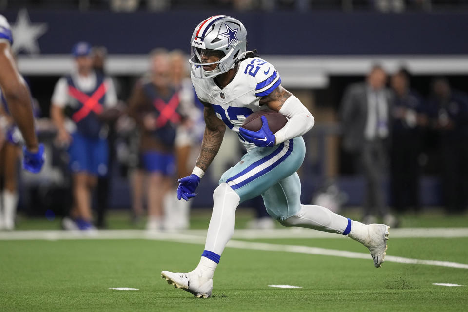 Dallas Cowboys running back Rico Dowdle (23) carries in the second half of an NFL football game against the New York Giants, Sunday, Nov. 12, 2023, in Arlington, Texas. (AP Photo/Tony Gutierrez)