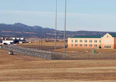 FILE PHOTO: A patrol vehicle is seen along the fencing at the Federal Correctional Complex, including the Administrative Maximum Penitentiary or "Supermax" prison, in Florence, Colorado February 21,2007. REUTERS/Rick Wilking/File Photo