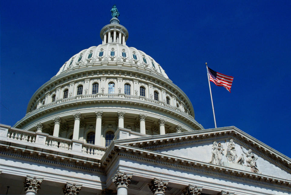 The stars and stripes flag flying at the Capitol Building, Washington, USA. / Credit: Tim Graham / Getty Images