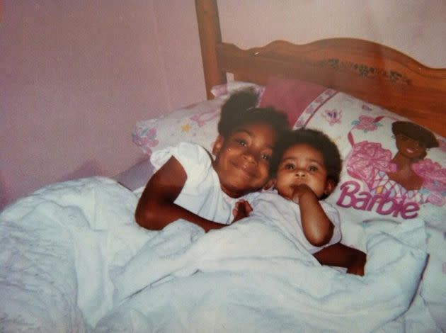 Courtney Sprewer and her little sister Kamryn in their Black Princess Christie bed set.