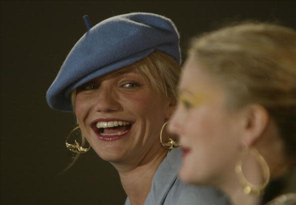 Actress Cameron Diaz shares a laugh with Drew Barrymore during the Charlies Angels press conference at the Sydney Opera House June 5, 2003 in Sydney, Australia. (Photo by Adam Pretty/Getty Images).